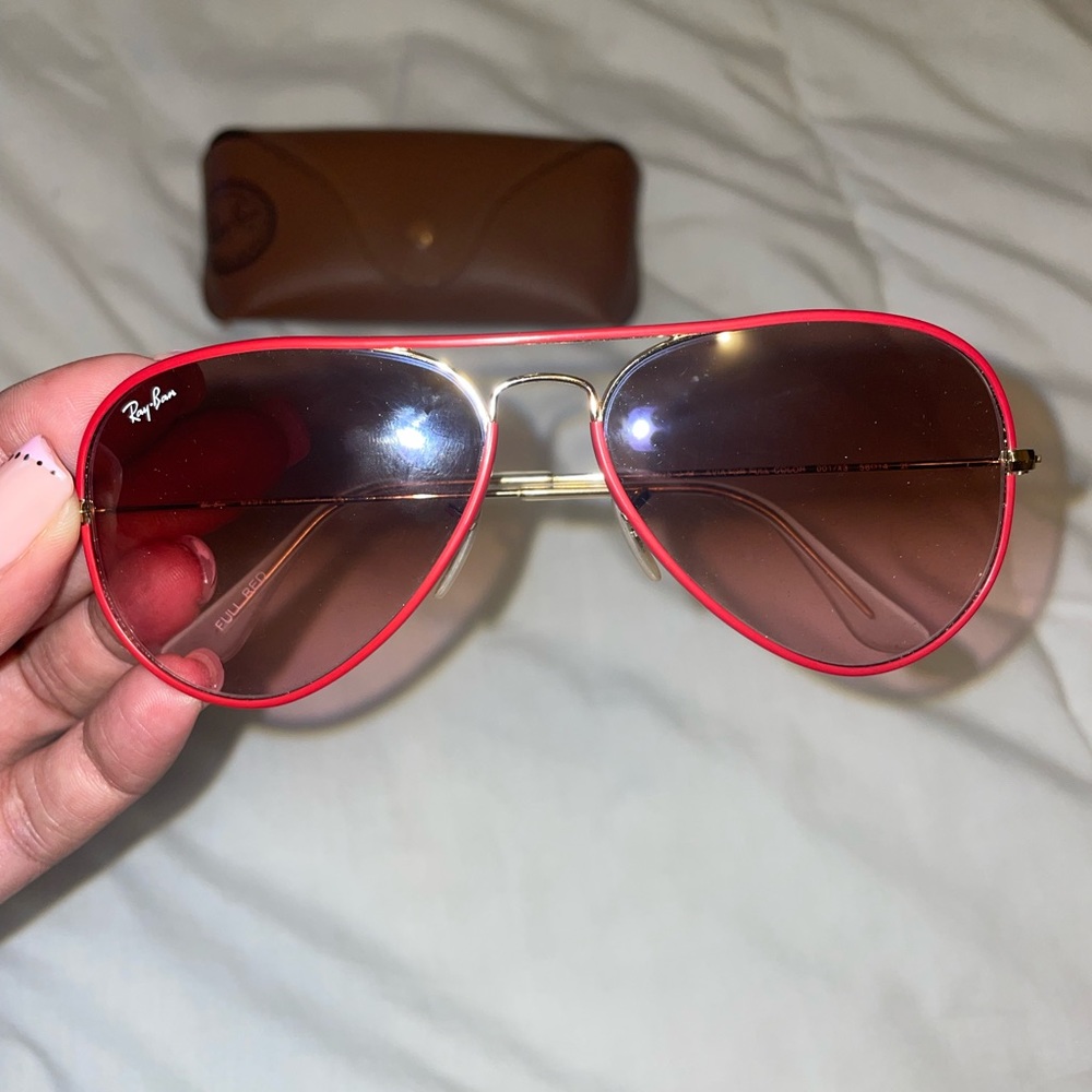 Red aviator style gold hardware case included